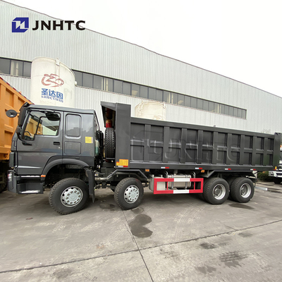 Черная сверхмощная новая модель тележки Tipper колес 420hp Sinotruk самосвала 12