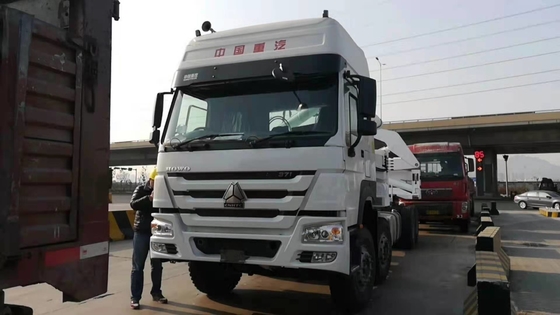 Кран Sinotruk Howo 8x4 установленный тележкой с краном Mqh37a подъема Xcmg 37t бортовым